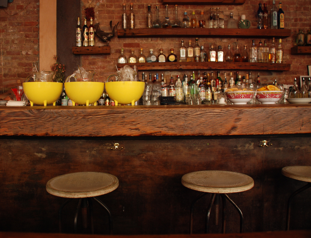 rustic barstools in bar